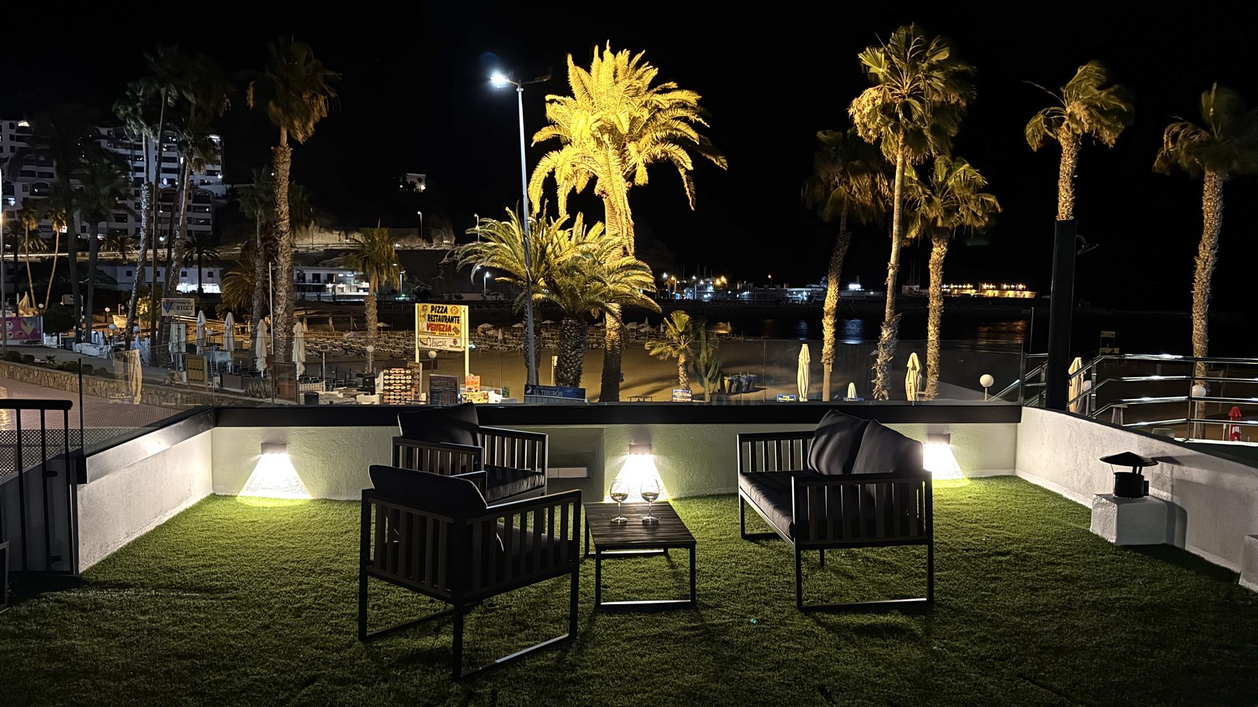 Terrace at dusk overlooking the marina